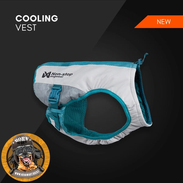 Eine Hunde-Kühlweste ist flach auf einem dunklen Hintergrund ausgebreitet. Die Weste ist hellgrau oder silbern mit leuchtend blauen Rändern und einem blauen Netzstoff im unteren und oberen Bereich. Das Logo "Non-stop dogwear" ist prominent auf der Oberseite platziert. Ein blauer Verstellgurt mit Schnalle ist sichtbar. Oben links steht "COOLING VEST", oben rechts ein orangefarbenes "NEW"-Banner. Unten links ist das runde Logo "Born to Rock - www.hovawart.rocks" eingeblendet.